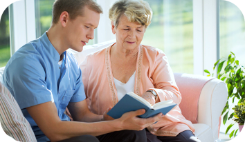 grandma reading books with his caretaker